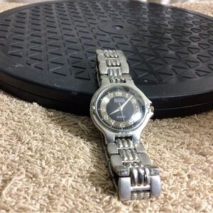 Bulova Silver Watch with Black Dial and Gold Accents